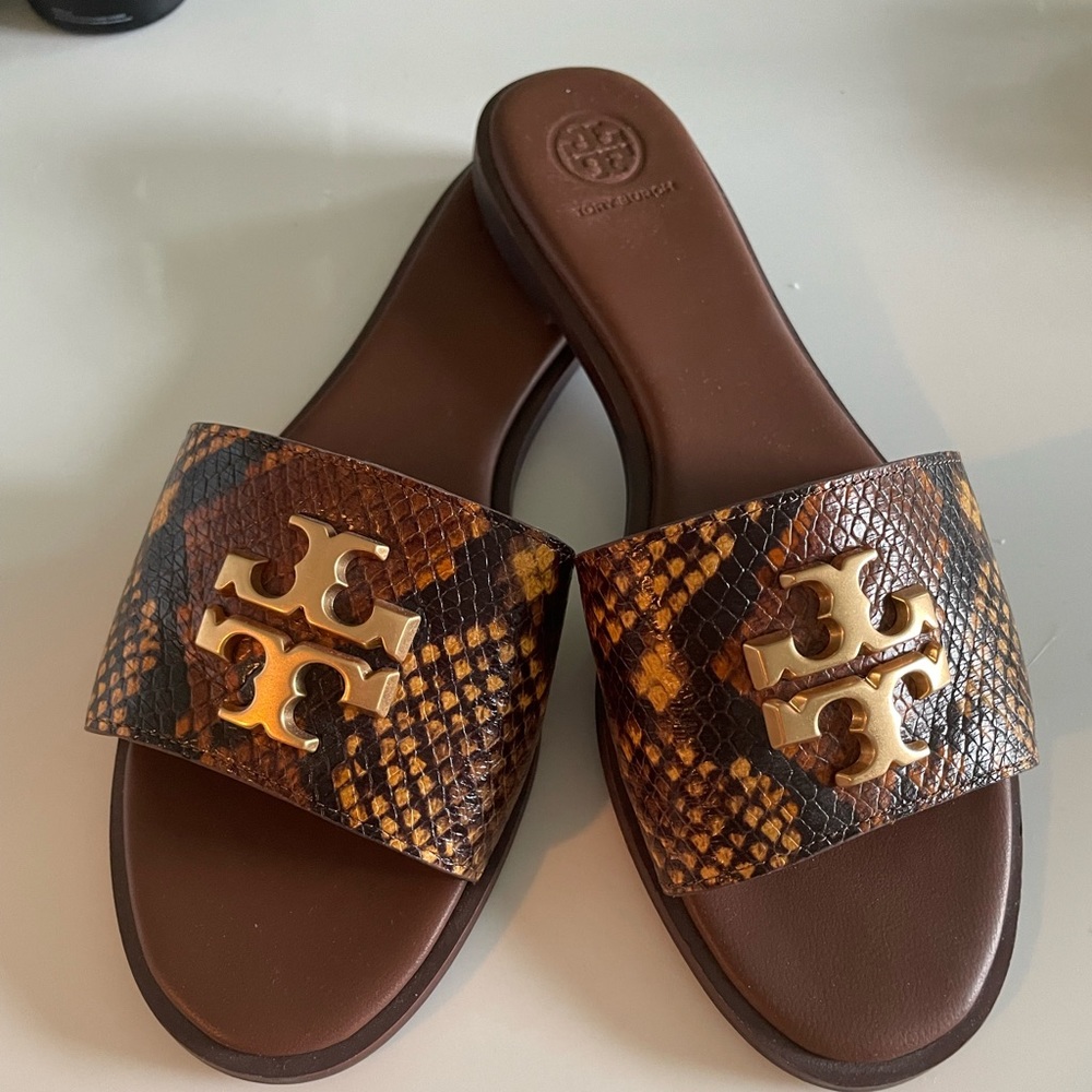 Tory Burch snakeskin sandals.